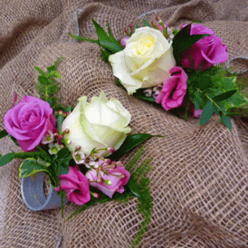 White and pink buttonhole