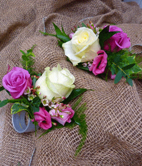 White rose and pink buttonholes
