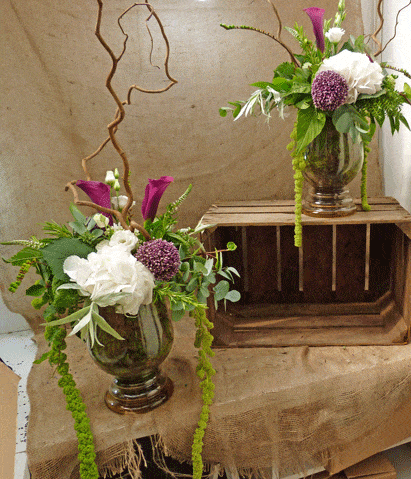 Hurricane vase wedding table centres