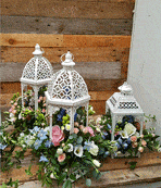 Pastel lanterns wedding table centres