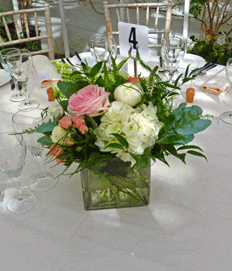 Pink and white wedding table centre