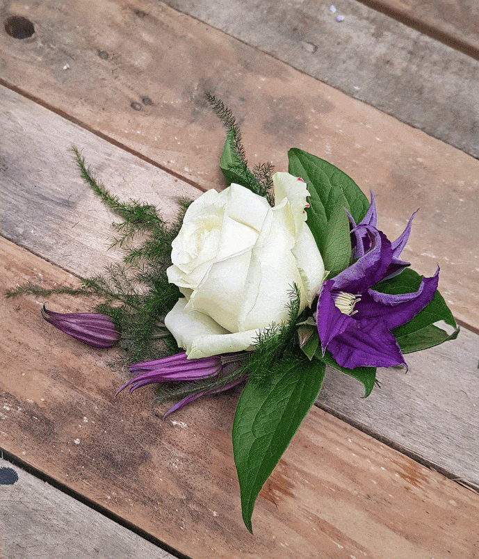 White rose and purple buttonhole
