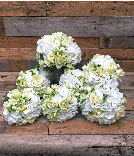 White bridal bouquets, roses, hydrangea, freesia
