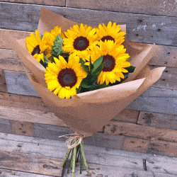Sunflower bouquet in paper